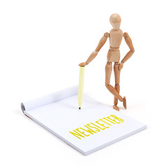 Image showing Wooden mannequin writing - Newsletter