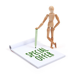 Image showing Wooden mannequin writing - Special offer