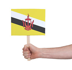 Image showing Hand holding small card - Flag of Brunei