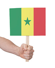 Image showing Hand holding small card - Flag of Senegal