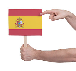 Image showing Hand holding small card - Flag of Spain