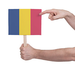 Image showing Hand holding small card - Flag of Romania
