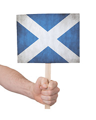 Image showing Hand holding small card - Flag of Scotland