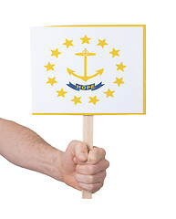 Image showing Hand holding small card - Flag of Rhode Island