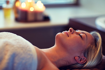 Image showing young woman lying in spa