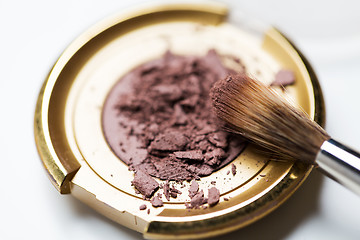 Image showing close up of makeup brush and eyeshadow