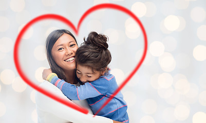 Image showing happy mother and daughter hugging