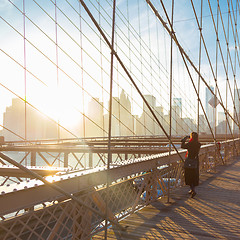 Image showing Brooklyn bridge at sunset, New York City.