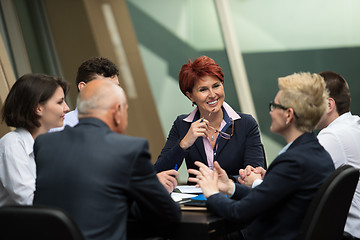 Image showing business people group on meeting at modern bright office