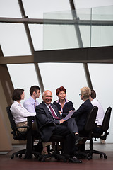 Image showing business people group on meeting at modern bright office