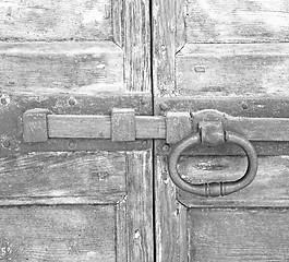 Image showing europe old in  italy  antique close brown door and rusty lock  c