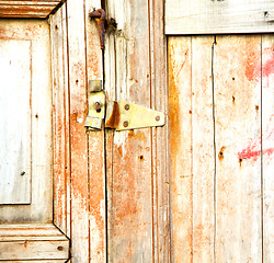 Image showing brown  morocco in africa the old wood  facade home and rusty saf