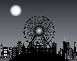 Image showing Ferris wheels at night time