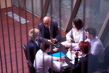 Image showing business people group on meeting at modern bright office