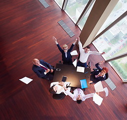 Image showing top view of business people group throwing dociments in air