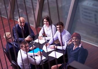 Image showing business people group on meeting at modern bright office