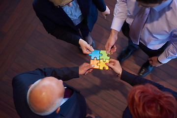 Image showing assembling jigsaw puzzle