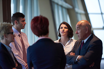 Image showing business people group on meeting at modern bright office