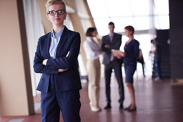 Image showing business people group, woman in front  as team leader