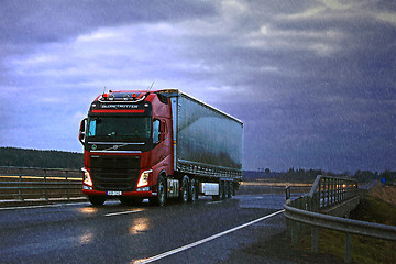 Image showing Red Volvo FH Semi and Dark Sky