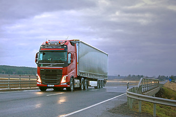 Image showing Red Volvo FH Semi and Dark Sky