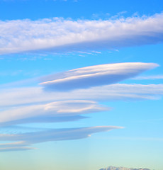 Image showing in the blue sky white soft clouds and abstract background