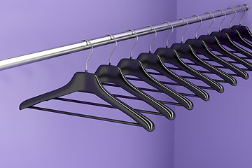 Image showing Hangers in the closet 