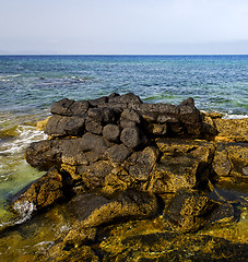 Image showing in lanzarote froth coastline  spain pond  rock stone sky cloud b