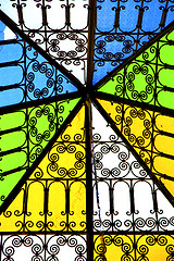 Image showing colorated glass  sun in  window and light