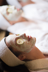 Image showing woman in spa  with cosmetic mask