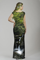 Image showing double exposure of elegant woman in fashionable dress posing in 