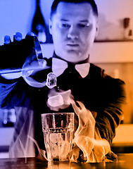 Image showing pro barman prepare coctail drink on party