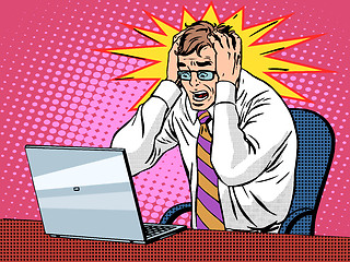 Image showing Businessman working on laptop bad news panic