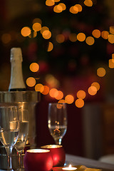 Image showing champagne and glasses at home on christmas night