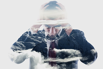 Image showing double exposure of depressed business man