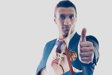 Image showing double exposure of Businessmen making his thumb up saying OK