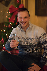 Image showing young man with champagne glass  on party