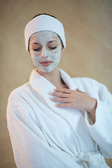 Image showing woman in spa  with cosmetic mask