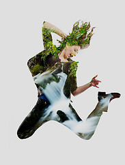 Image showing double exposure of nature and  young woman dancing