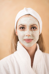 Image showing woman in spa  with cosmetic mask