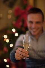 Image showing young man with champagne glass  on party