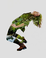 Image showing double exposure of nature and  young woman dancing