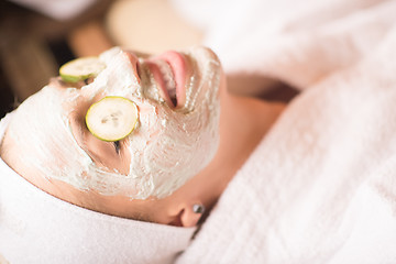 Image showing woman in spa  with cosmetic mask