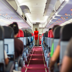 Image showing Stewardess on the airplane.