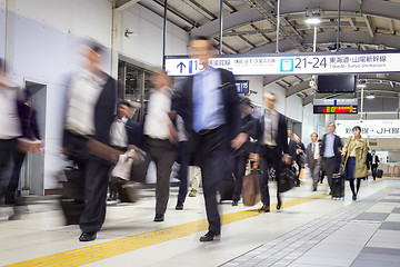 Image showing Business people traveling by Tokyo metro.