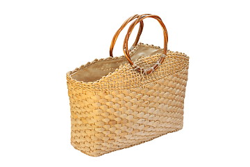 Image showing wicker handbag over white