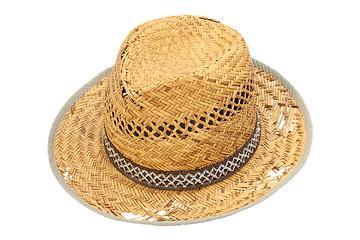 Image showing old damaged wicker hat over white