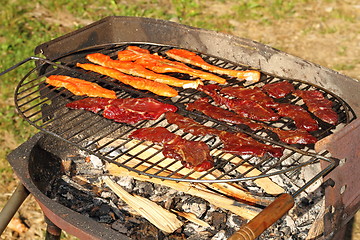 Image showing salmon and beef on barbecue