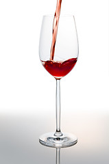 Image showing Pouring red wine