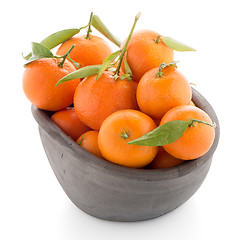 Image showing Tangerines on clay bowl 